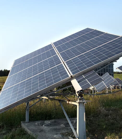 Sunlight glinting off solar panels on a residential building on the Sunshine Coast.